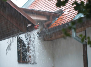 red roof with pouring rain