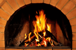 roaring fire in the fireplace