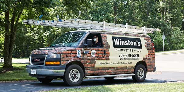 Winston's Chimney Service Work Truck parked in residential driveway