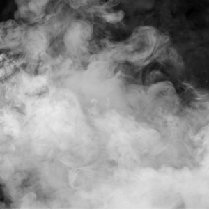 close up view of smoke floating in front of a black background