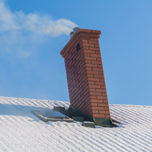 chimney on a snowy roof with smoke coming out