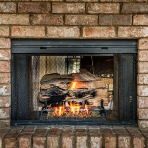 gas fireplace insert in a masonry fireplace