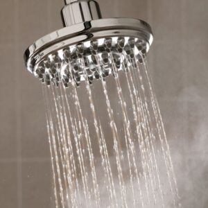 water coming out of a shower heat with steam coming up